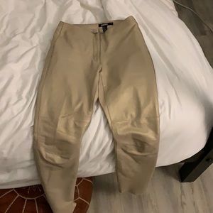 90’s cut DKNY gold tan leather pants.